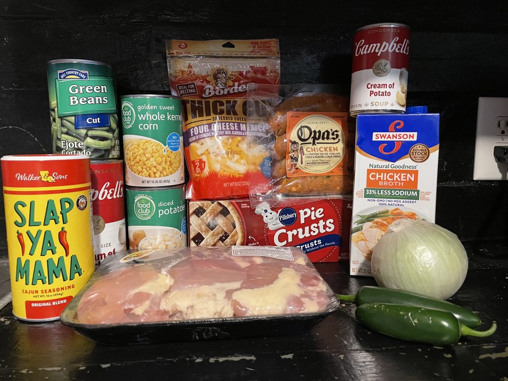 Ingredients for cheesy chicken and sausage pot pie.
